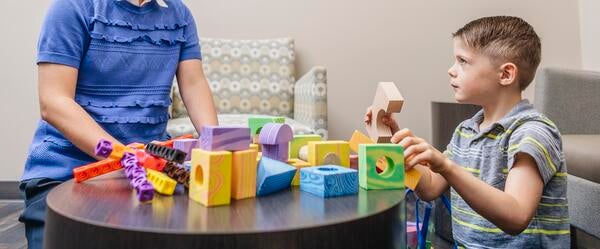 Child working with blocks